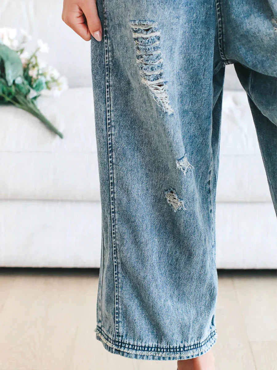 Salopette in denim ampio e consumato